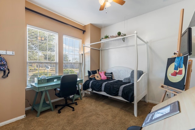 12622 Baldwin Springs Ct, Tomball, TX 77377 - carpeted bedroom with baseboards, a ceiling fan, and a desk