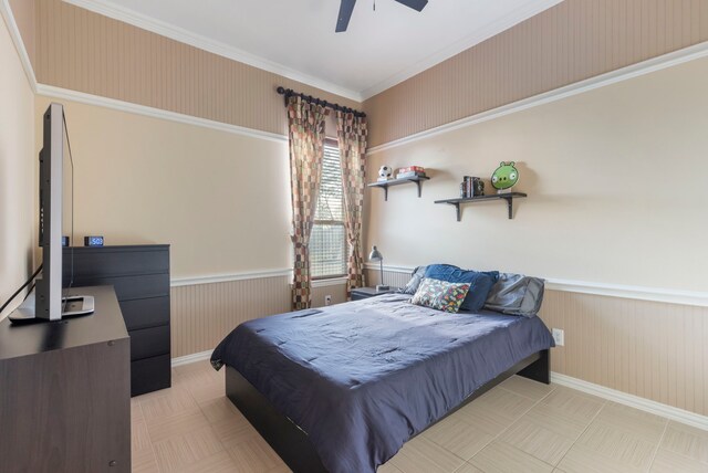 12622 Baldwin Springs Ct, Tomball, TX 77377 - bedroom featuring wainscoting, crown molding, a ceiling fan, and baseboards