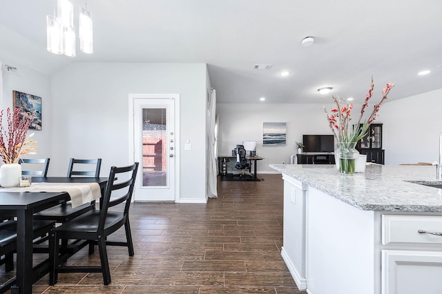 dining area featuring sink