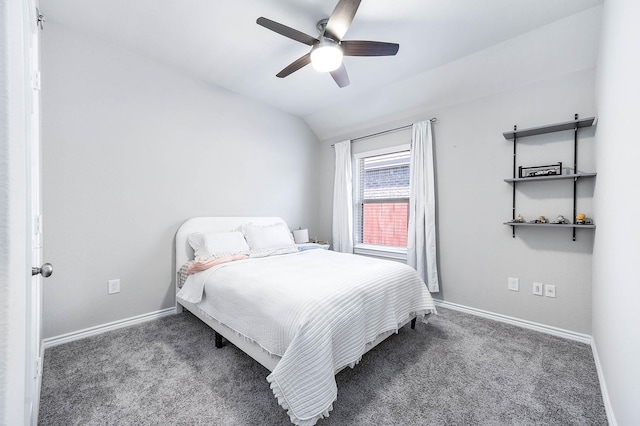 carpeted bedroom featuring lofted ceiling and ceiling fan