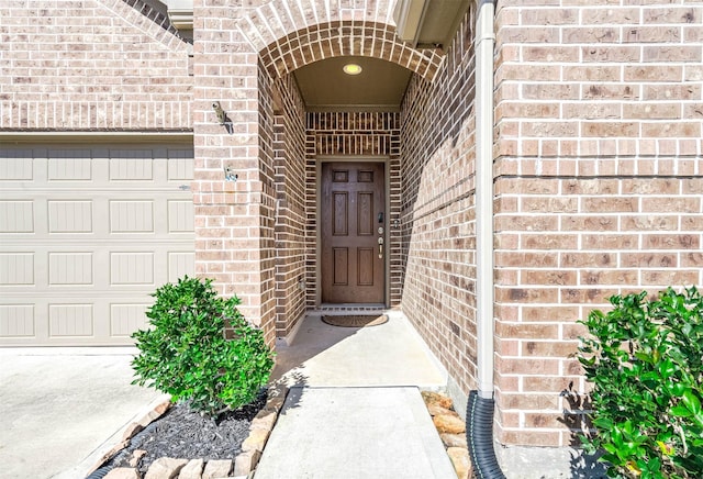 entrance to property with a garage