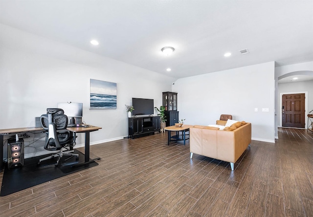 living room with dark hardwood / wood-style floors