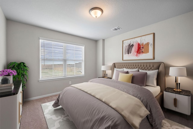 bedroom with light carpet