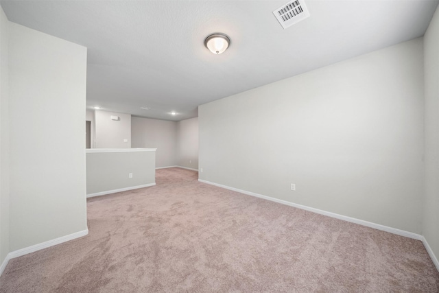 basement with light carpet