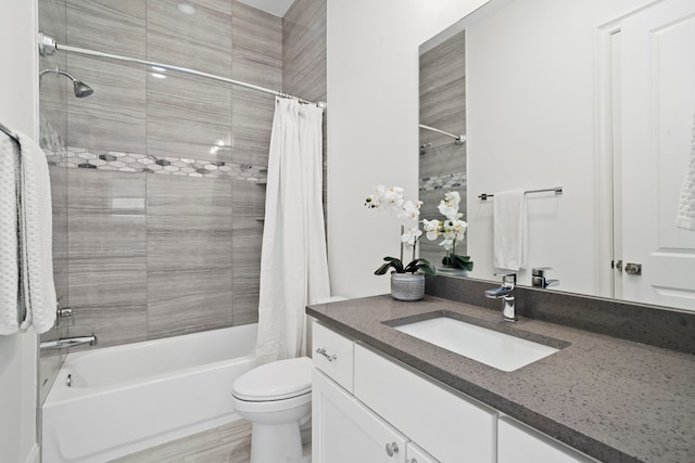 full bathroom with vanity, toilet, and shower / bath combo with shower curtain