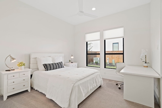 carpeted bedroom with ceiling fan