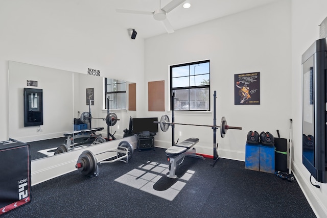 workout area with ceiling fan