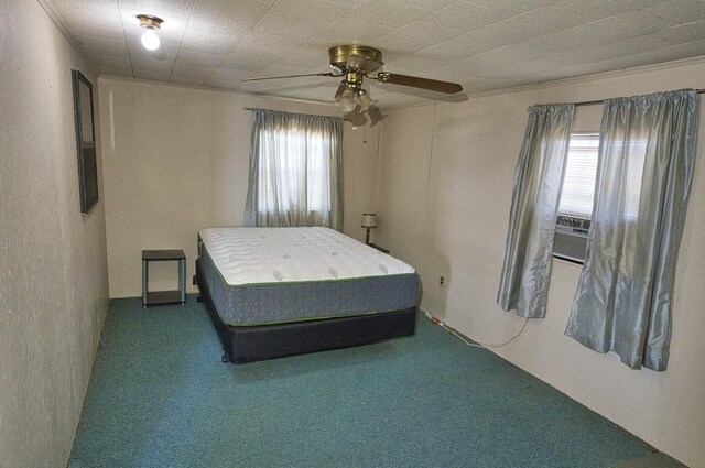 carpeted bedroom featuring cooling unit and ceiling fan