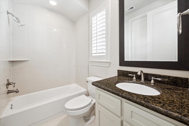 bathroom featuring visible vents, vanity, toilet, and shower / bathtub combination