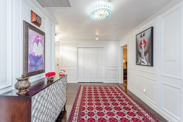 hall with dark hardwood / wood-style floors