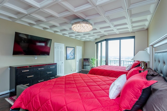 bedroom featuring hardwood / wood-style flooring, access to exterior, coffered ceiling, and beam ceiling