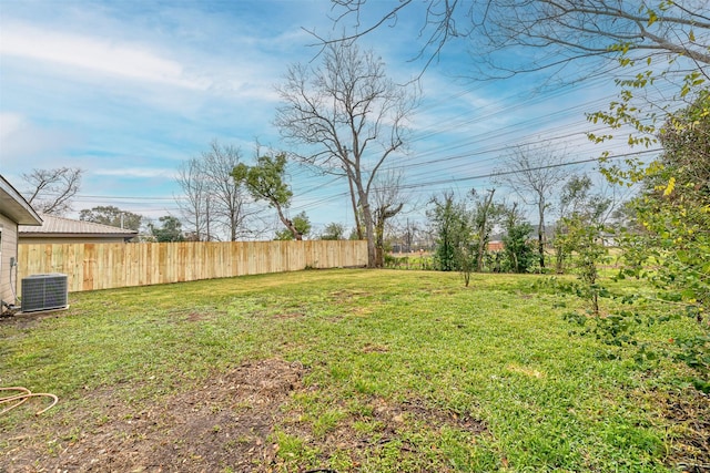 view of yard featuring central AC unit