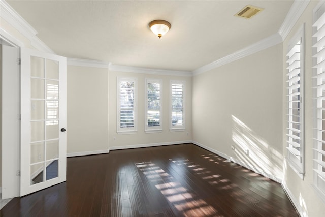 unfurnished room with ornamental molding and dark hardwood / wood-style flooring