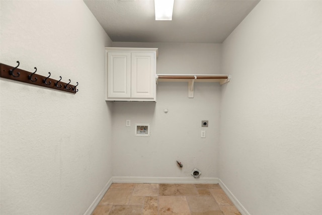 clothes washing area with hookup for a gas dryer, electric dryer hookup, washer hookup, and cabinets