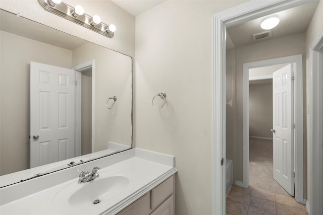 bathroom featuring vanity and tile patterned floors