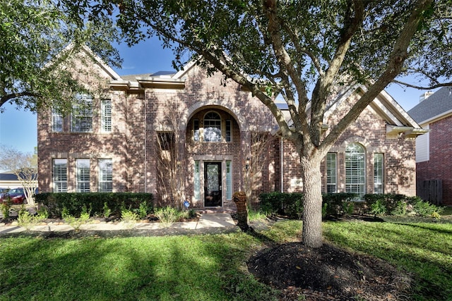 view of front of house with a front lawn