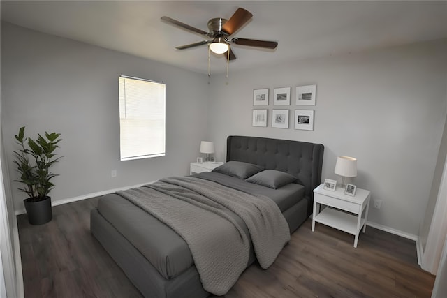 bedroom featuring dark wood-type flooring and ceiling fan