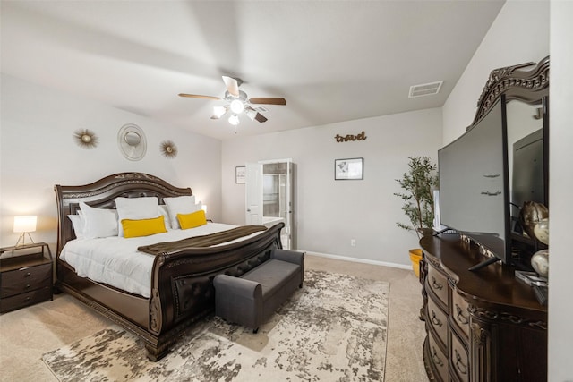 carpeted bedroom featuring a ceiling fan, baseboards, and visible vents