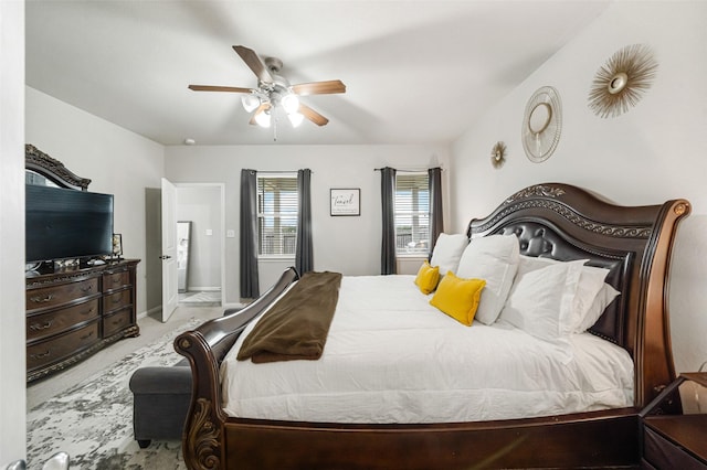 carpeted bedroom with a ceiling fan