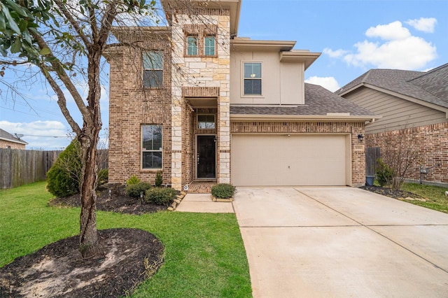 view of front of home with a front yard, fence, a garage, stone siding, and driveway