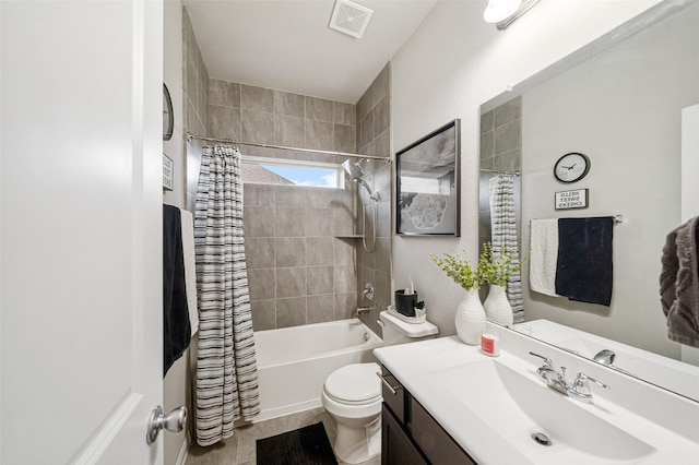 full bath with visible vents, toilet, shower / tub combo with curtain, and vanity