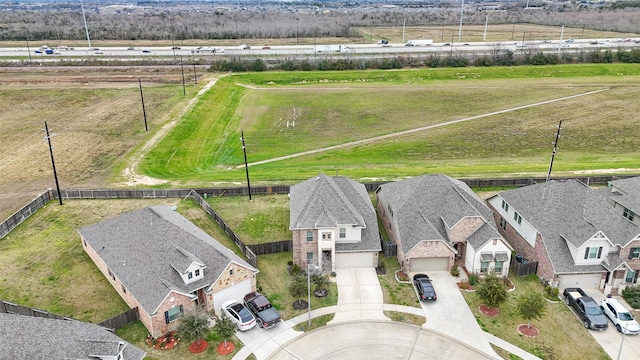 birds eye view of property with a residential view