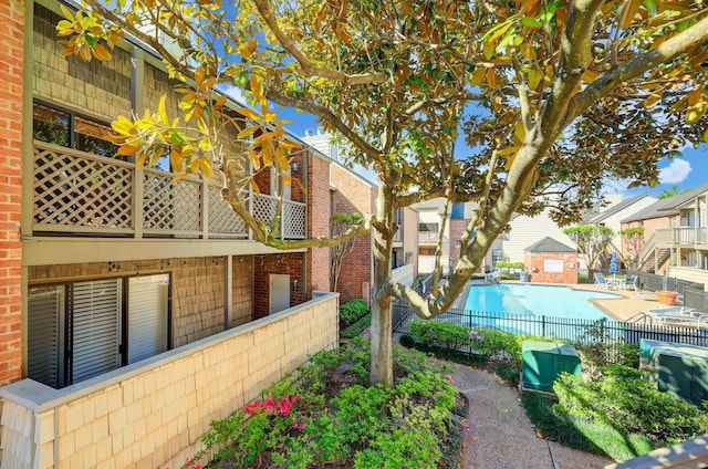 view of pool featuring a patio area