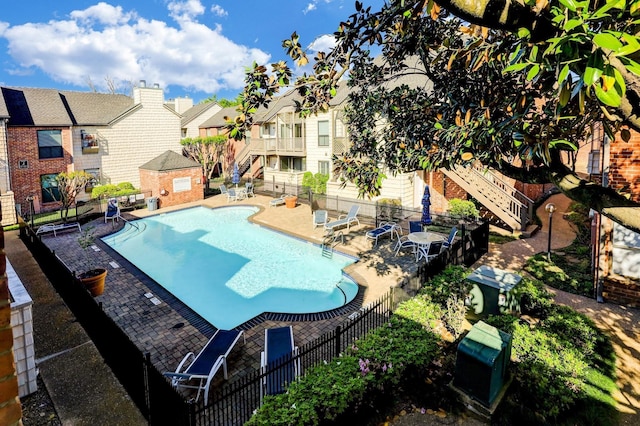 view of pool with a patio