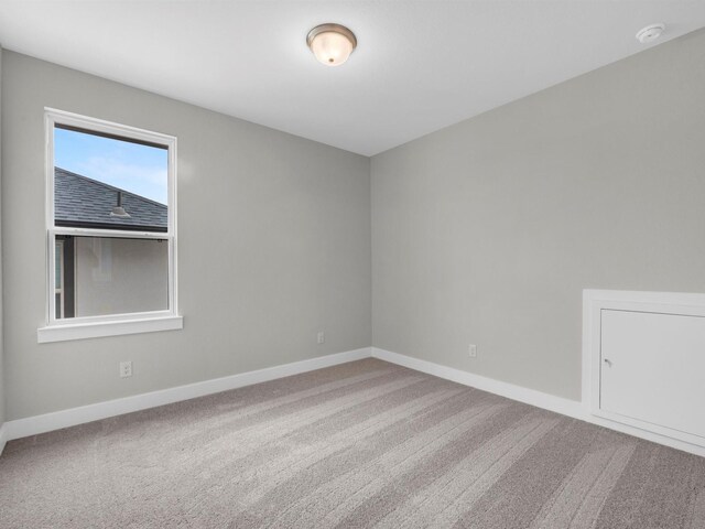 29651 Bur Creek Ln, Fulshear, TX 77441 - empty room with baseboards, carpet flooring, and a smoke detector