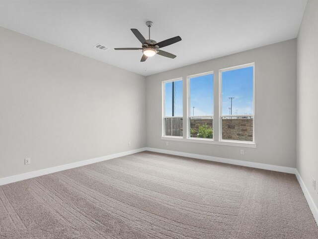 29651 Bur Creek Ln, Fulshear, TX 77441 - carpeted empty room featuring baseboards and ceiling fan