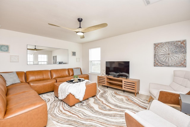 living room with ceiling fan