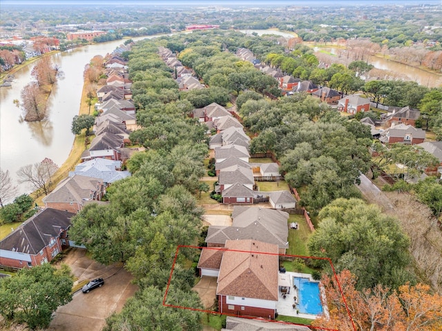 bird's eye view with a water view