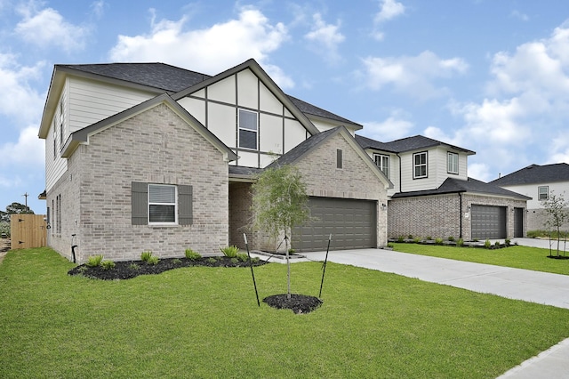 view of front facade with a garage and a front yard