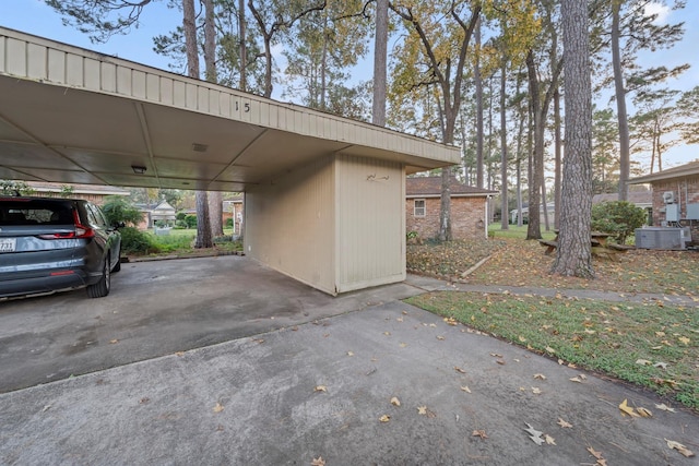 view of parking / parking lot with a carport