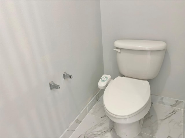 bathroom featuring toilet