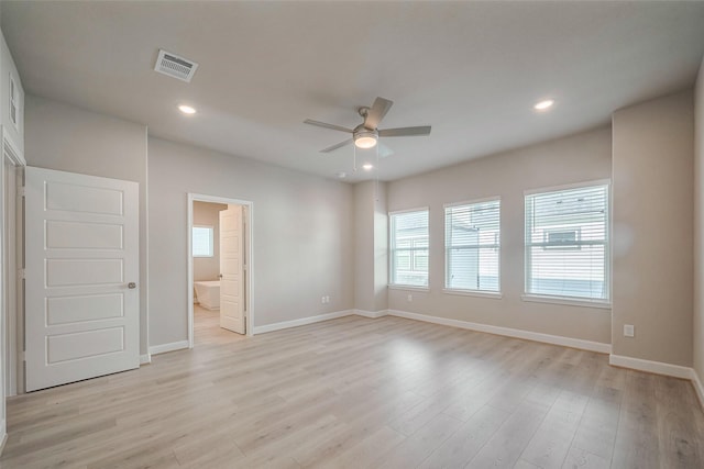 empty room featuring ceiling fan, recessed lighting, visible vents, and light wood-style floors