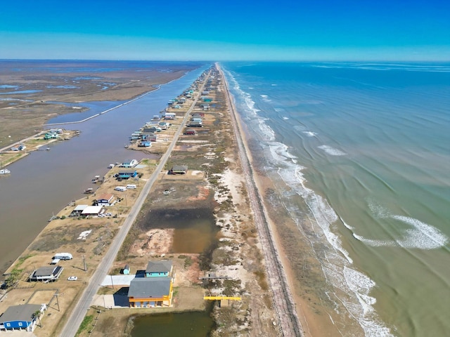 aerial view with a beach view and a water view