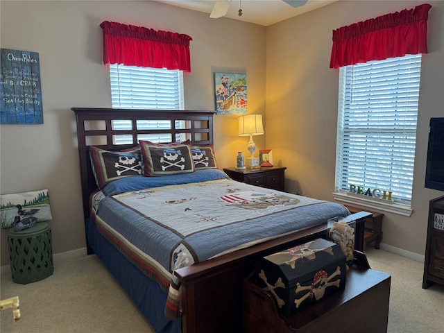 bedroom featuring light colored carpet