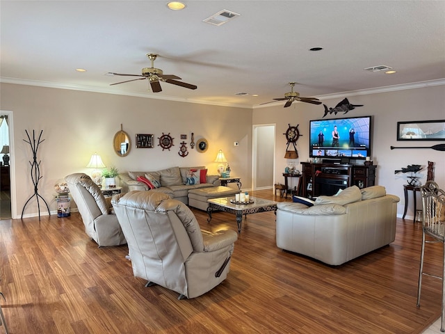 living room with crown molding, ceiling fan, and hardwood / wood-style floors