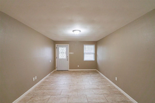 view of tiled foyer entrance