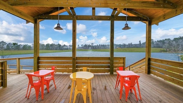 dock area with a gazebo and a water view