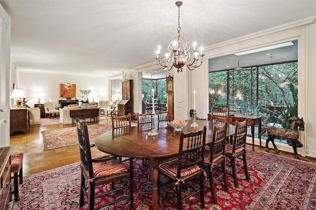 dining room with an inviting chandelier, parquet floors, and ornamental molding