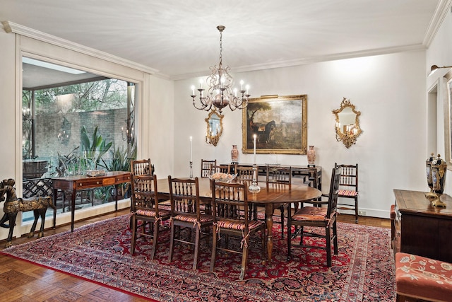 dining room with an inviting chandelier, ornamental molding, and parquet floors