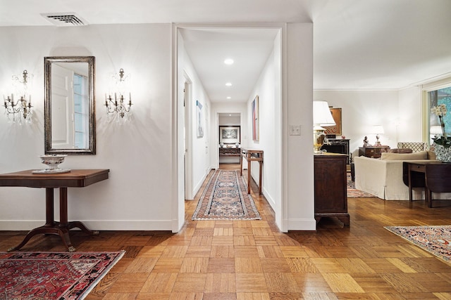 corridor with light parquet flooring