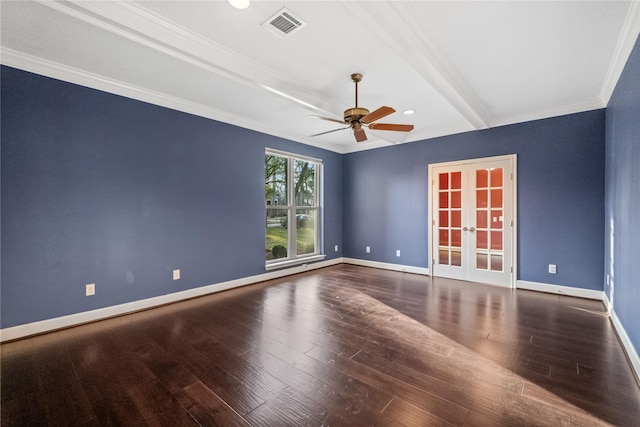 empty room with beamed ceiling, ornamental molding, hardwood / wood-style floors, and french doors