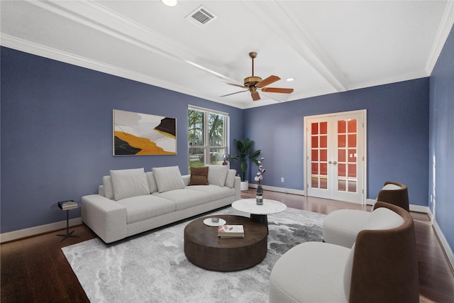 living room with crown molding, ceiling fan, hardwood / wood-style floors, beam ceiling, and french doors