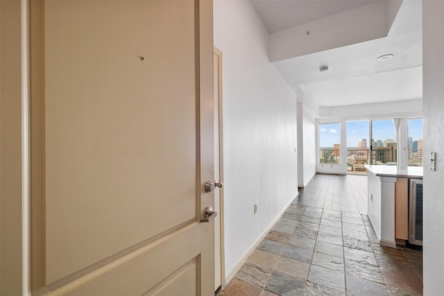 hallway featuring wine cooler