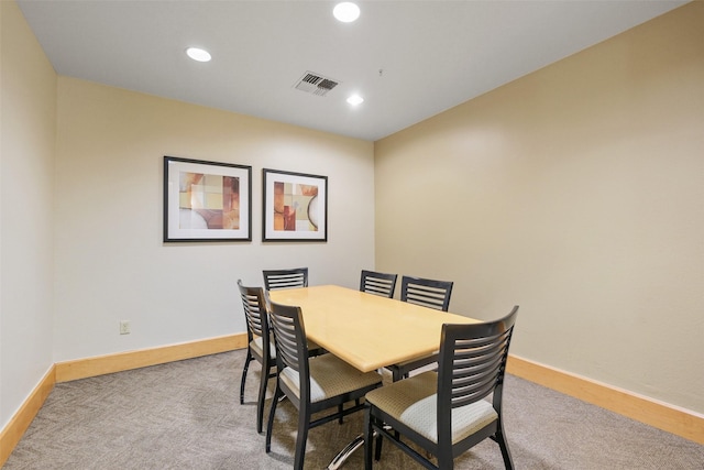 view of carpeted dining space