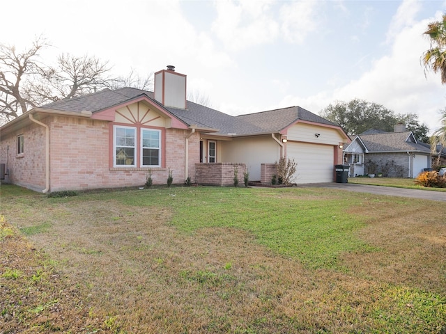 ranch-style home featuring central AC, a garage, and a front yard