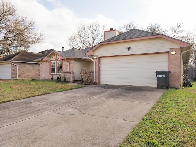 single story home featuring a garage and a front lawn